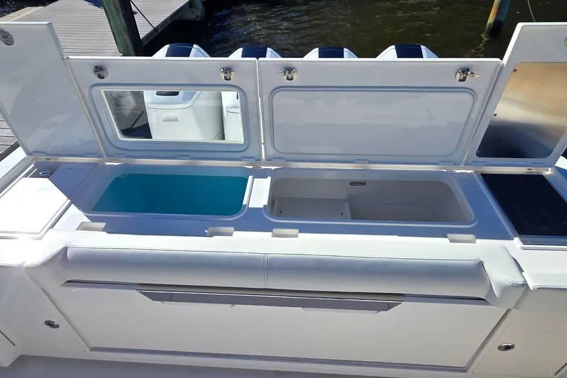 Slide: The Image of Luxury yacht Tiara Yachts 56 LS 2026 with open storage compartments on deck. - 23