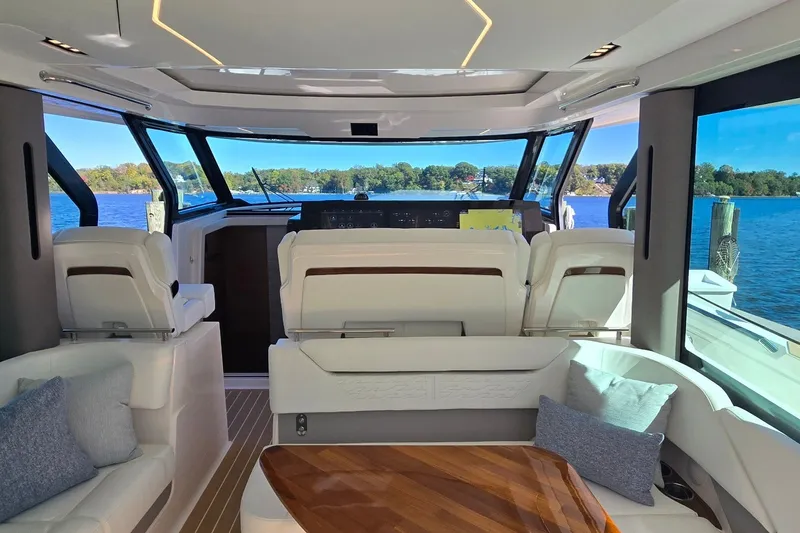 Slide: The Image of Luxurious interior of 2026 Tiara Yachts 56 LS with scenic water view. - 42