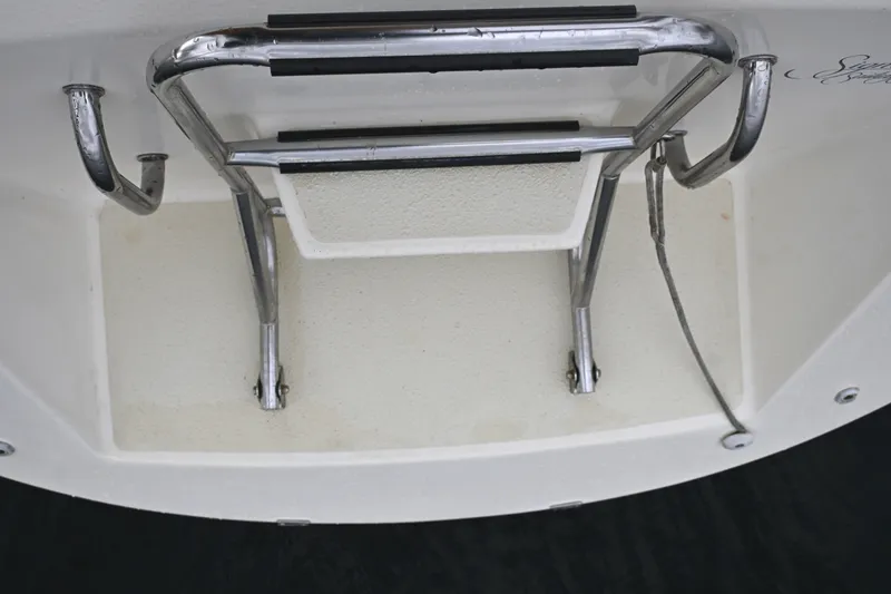 Slide: The Image of Stainless steel swim ladder on 2001 Caliber 40 LRC boat deck. - 28
