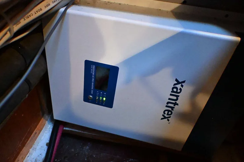 Slide: The Image of Xantrex inverter installed in a 2001 Caliber 40 LRC boat. - 77
