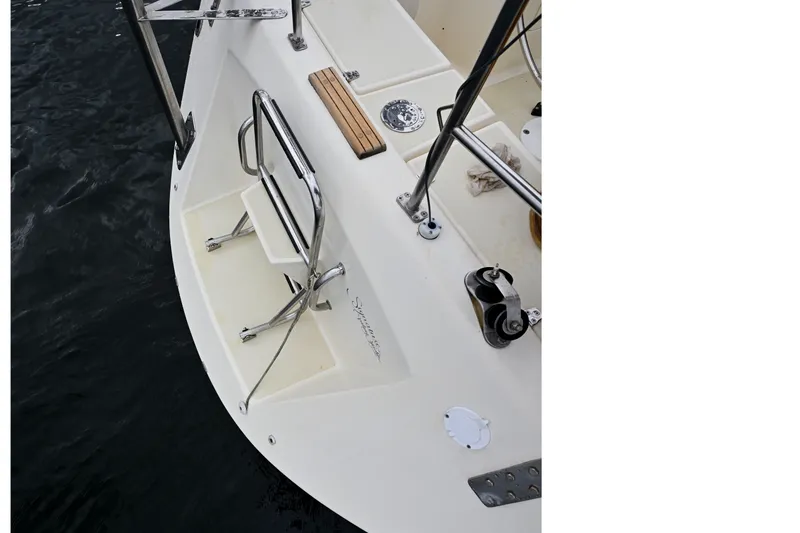 Slide: The Image of 2001 Caliber 40 LRC boat deck with stainless steel ladder and railing. - 27