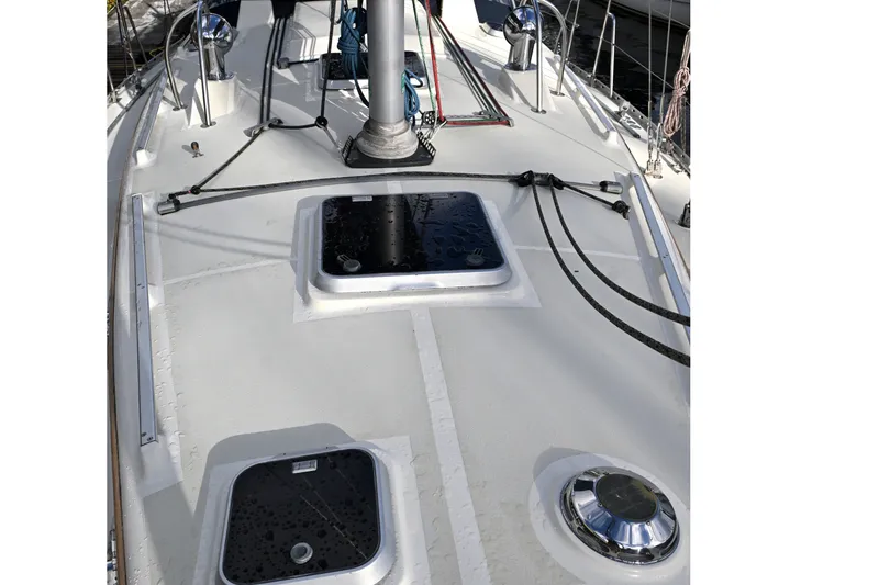 Slide: The Image of Deck view of 2001 Caliber 40 LRC sailboat with hatches and rigging. - 21