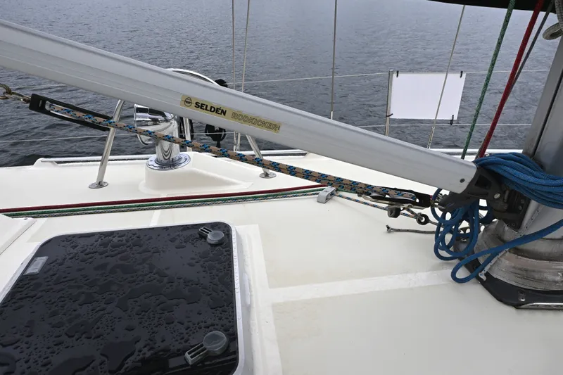 Slide: The Image of Sailboat deck with Selden Rodkicker, Caliber 40 LRC, 2001 model, on calm water. - 18
