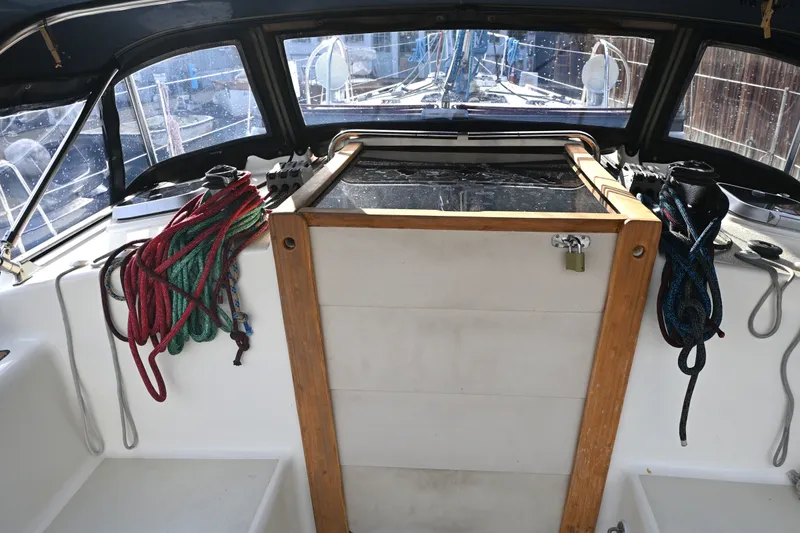 Slide: The Image of Cockpit of 2001 Caliber 40 LRC sailboat with ropes and hatch. - 29