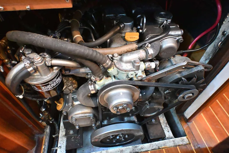 Slide: The Image of Engine compartment of a 2001 Caliber 40 LRC sailboat, showcasing mechanical components. - 70