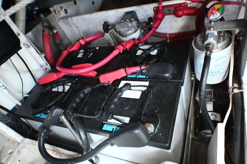 Slide: The Image of Battery compartment of a 2001 Caliber 40 LRC with wiring and components. - 75