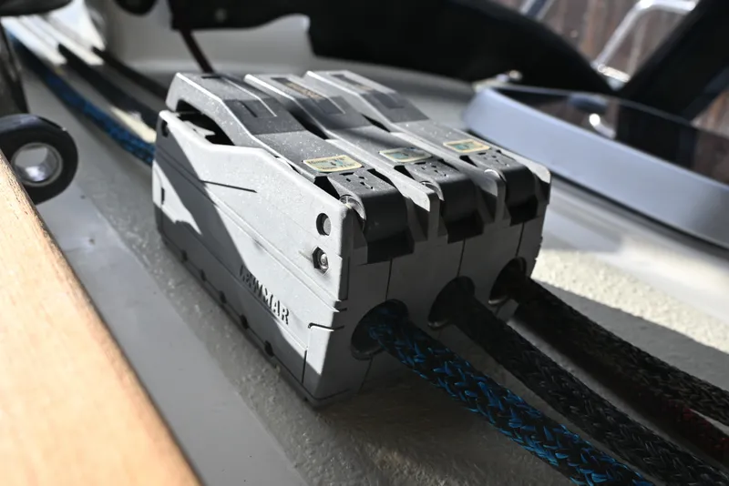 Slide: The Image of Close-up of a 2001 Caliber 40 LRC sailboat rope clutch system. - 37