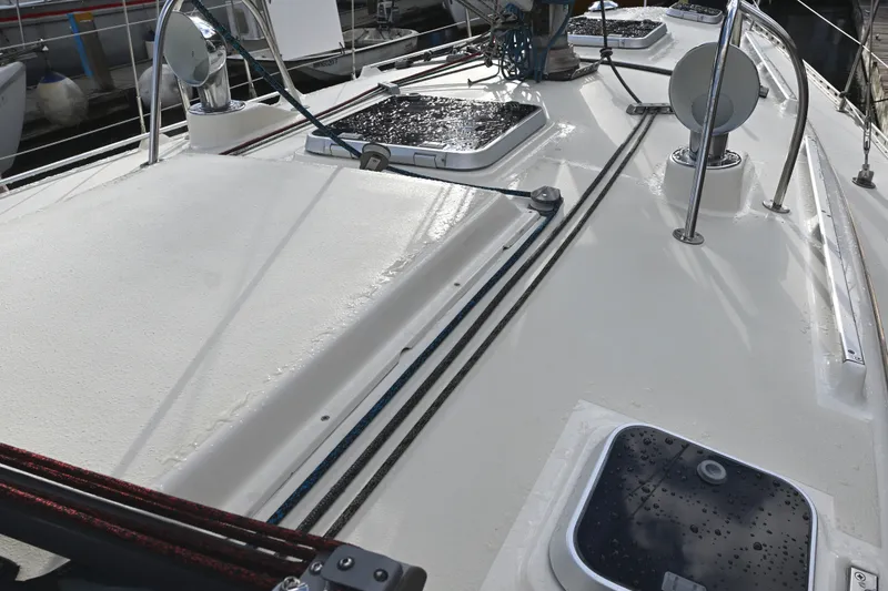 Slide: The Image of Deck view of 2001 Caliber 40 LRC sailboat with hatches and rigging. - 32