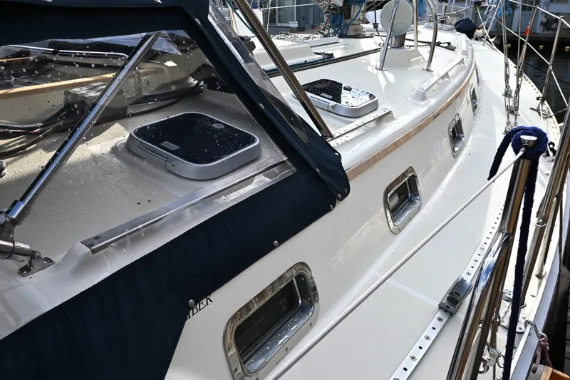 Slide: The Image of 2001 Caliber 40 LRC yacht deck with sleek design and modern features. - 9