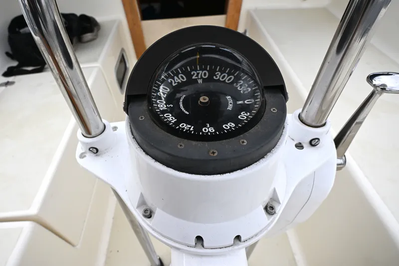 Slide: The Image of Compass on 2001 Caliber 40 LRC yacht, featuring Ritchie navigation system. - 26