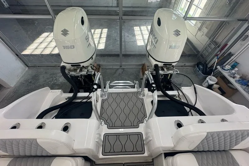 Slide: The Image of Twin Vee 260 CC SE 2020 boat with dual Suzuki 150 outboard engines. - 42
