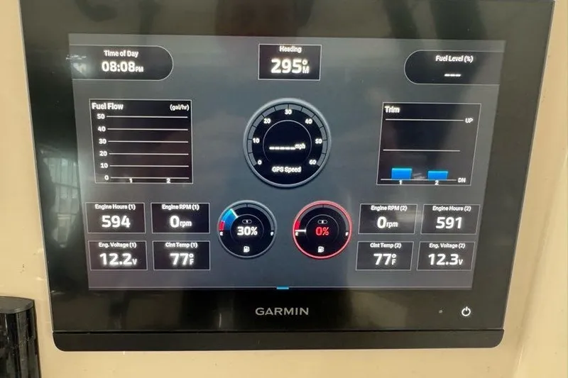 Slide: The Image of Garmin display on 2020 Twin Vee 260 CC SE showing engine and navigation data. - 28