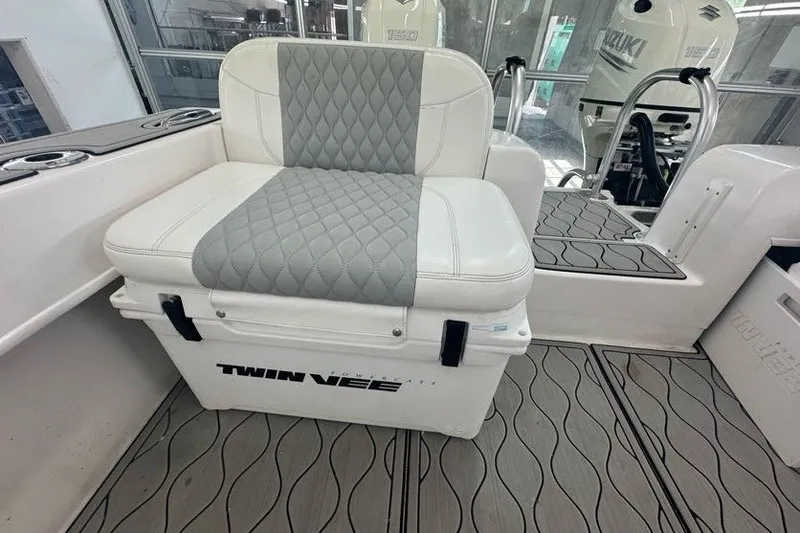 Slide: The Image of 2020 Twin Vee 260 CC SE boat seat with quilted cushion and storage compartment. - 40