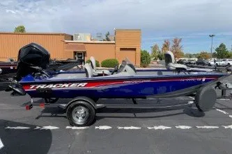 The Image of 2017 Tracker Pro Team 175 TF boat on trailer in parking lot. - 0