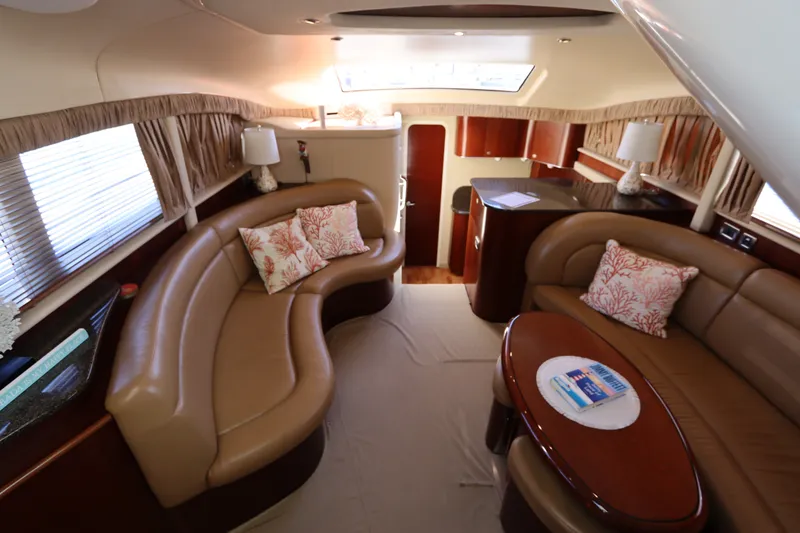 Slide: The Image of Luxurious interior of 2005 Sea Ray 390 Motor Yacht with plush seating and elegant decor. - 30