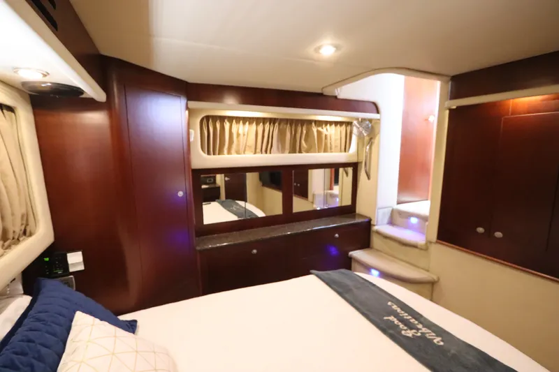 Slide: The Image of Luxurious interior of 2005 Sea Ray 390 Motor Yacht with elegant wood finishes. - 53