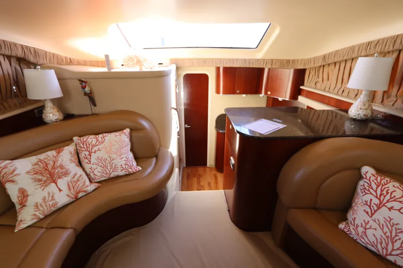 Slide: The Image of Interior of 2005 Sea Ray 390 Motor Yacht with elegant seating and decor. - 36