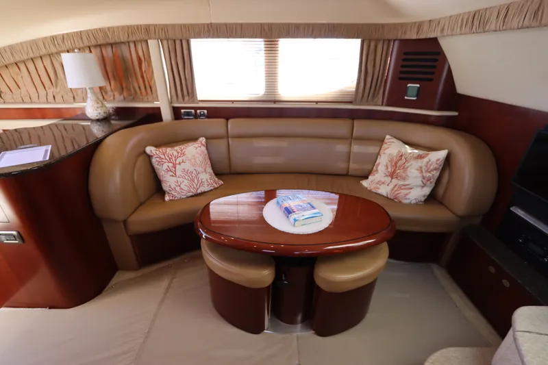 Slide: The Image of Luxurious interior of 2005 Sea Ray 390 Motor Yacht with elegant seating and decor. - 34