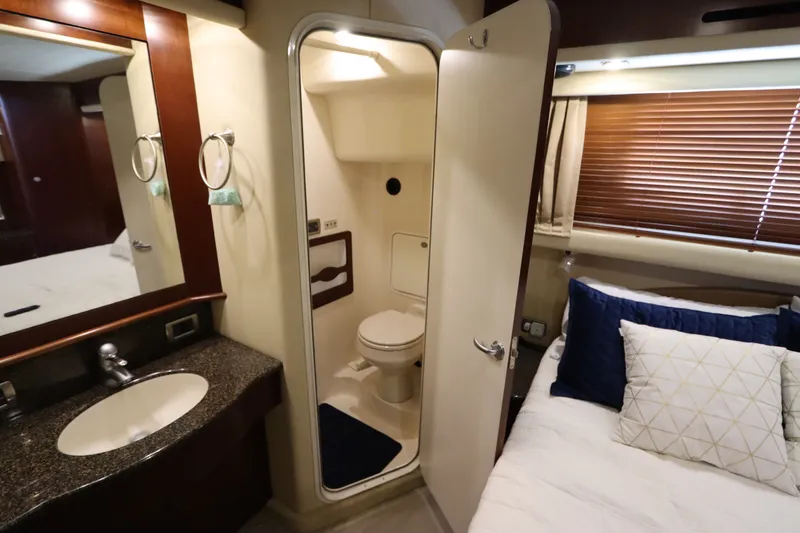 Slide: The Image of 2005 Sea Ray 390 Motor Yacht interior with bathroom and bedroom view. - 57