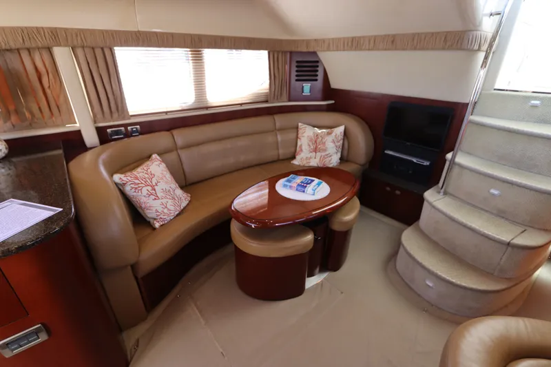 Slide: The Image of Luxurious interior of 2005 Sea Ray 390 Motor Yacht with plush seating and elegant decor. - 33