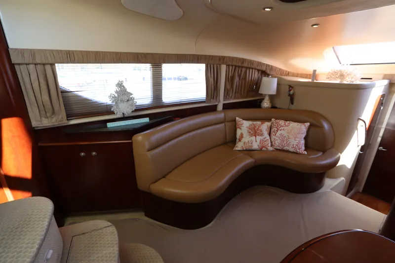 Slide: The Image of Luxurious interior of 2005 Sea Ray 390 Motor Yacht with elegant seating and decor. - 31