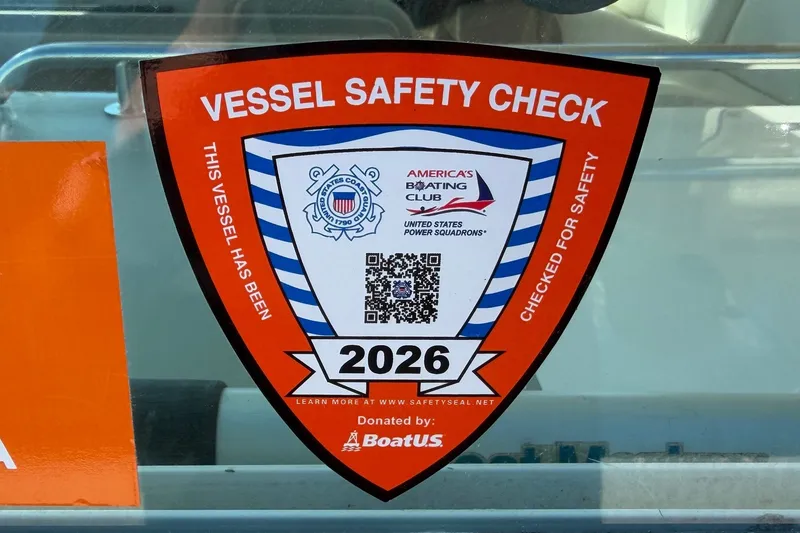 Slide: The Image of Sticker on 2005 Sea Ray 390 Motor Yacht indicating vessel safety check for 2026. - 67