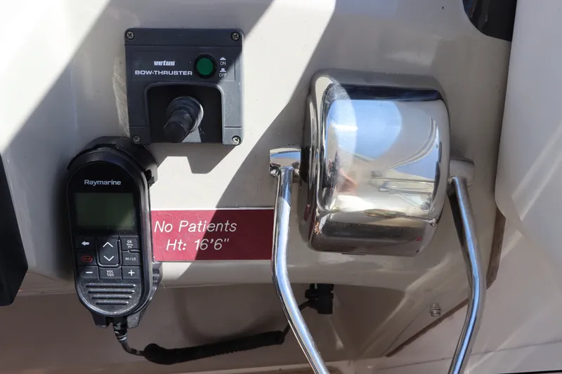 Slide: The Image of Control panel of a 2005 Sea Ray 390 Motor Yacht with bow thruster and Raymarine device. - 28