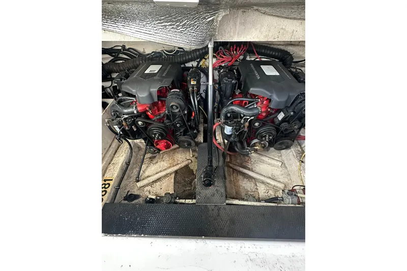 Slide: The Image of Twin engines in a 2002 Chaparral Signature 320 boat engine compartment. - 26