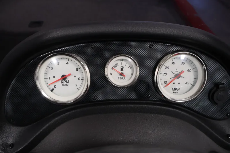 Slide: The Image of Dashboard gauges of a 2019 Tracker Pro 170 boat, showing RPM, fuel, and speed. - 22