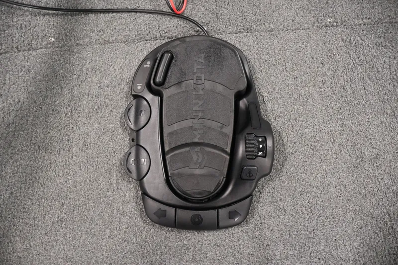 Slide: The Image of Foot pedal control on a 2019 Tracker Pro 170 boat, featuring Minn Kota branding. - 14