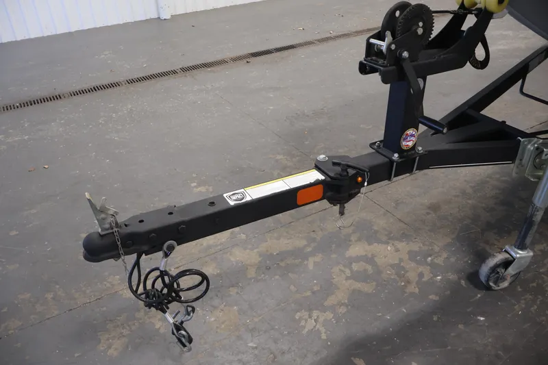 Slide: The Image of Trailer hitch of a 2019 Tracker Pro 170 boat on a concrete floor. - 33
