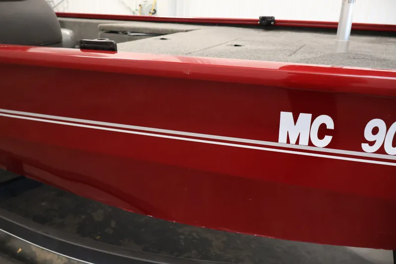 Slide: The Image of Red 2019 Tracker Pro 170 boat with registration number "MC 90" visible. - 40