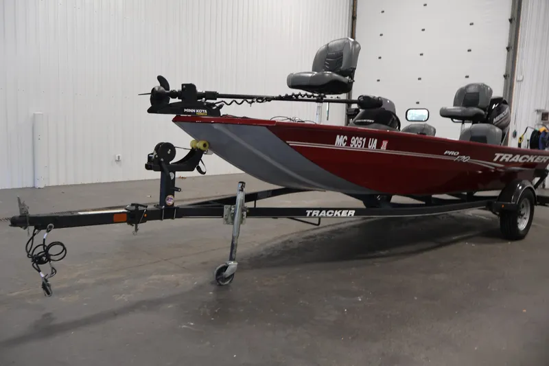 Slide: The Image of 2019 Tracker Pro 170 boat on trailer in indoor storage facility. - 34