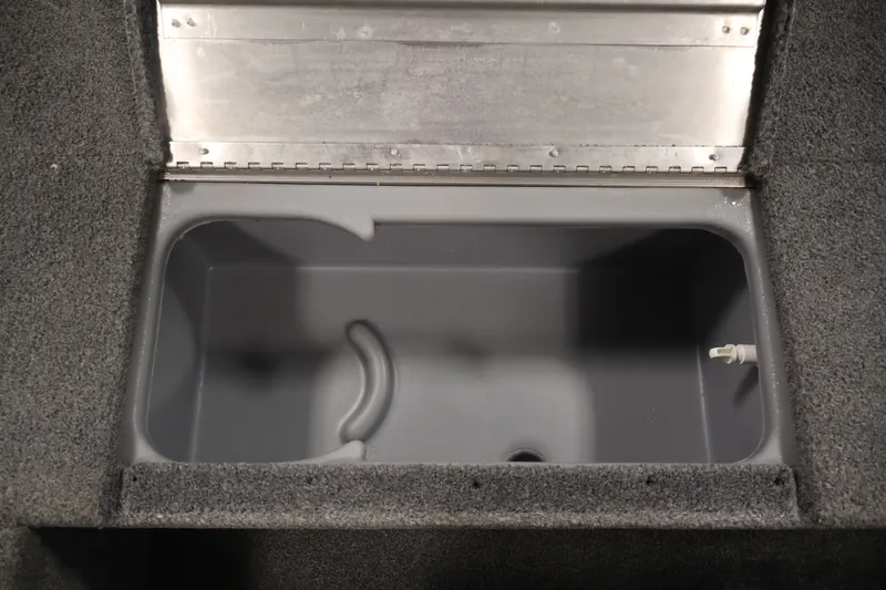Slide: The Image of 2019 Tracker Pro 170 boat livewell with open lid, showing interior details. - 18