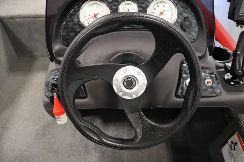 Slide: The Image of Steering wheel and dashboard of 2019 Tracker Pro 170 boat. - 21