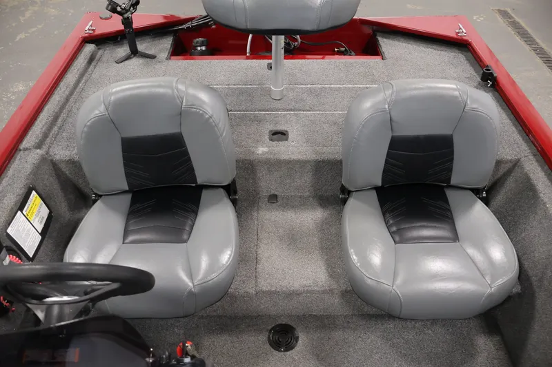 Slide: The Image of 2019 Tracker Pro 170 boat interior with two gray seats and steering wheel. - 27