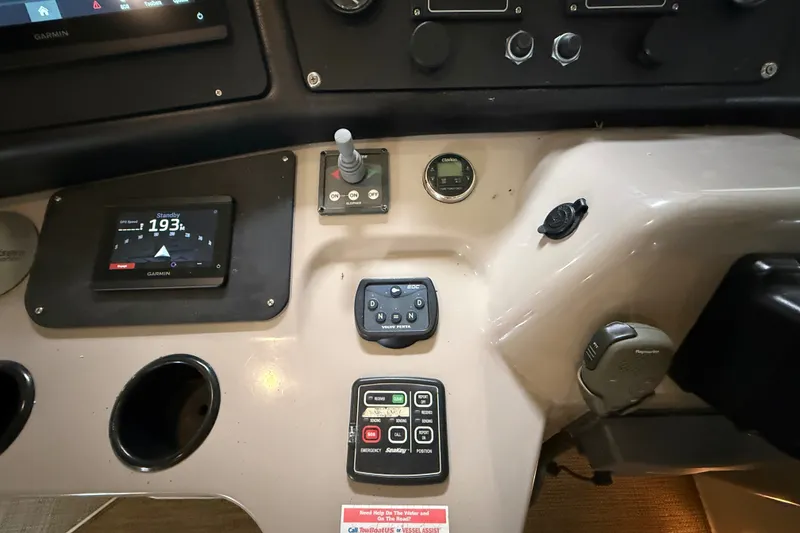 Slide: The Image of Dashboard of 2004 Cruisers Yachts 405 Express Motoryacht with Garmin display and controls. - 30