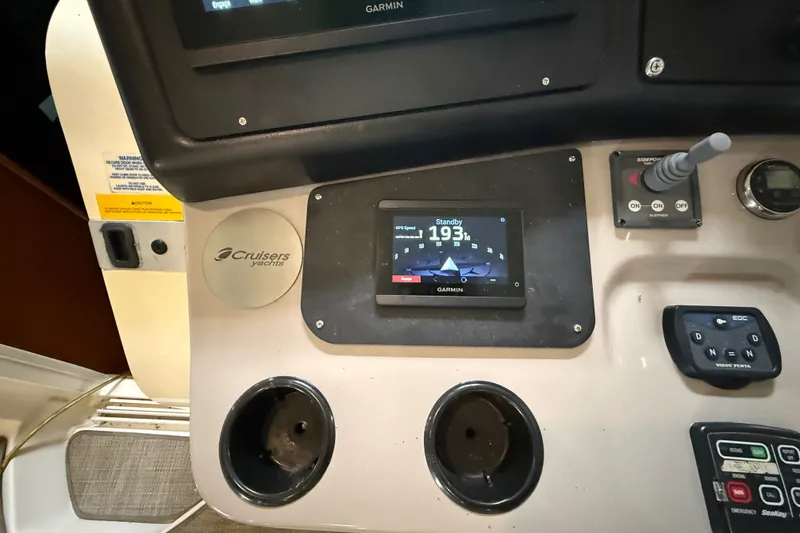 Slide: The Image of Dashboard of 2004 Cruisers Yachts 405 Express Motoryacht with Garmin navigation system. - 29