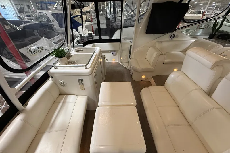 Slide: The Image of Luxurious interior of 2004 Cruisers Yachts 405 Express Motoryacht with white leather seating. - 17