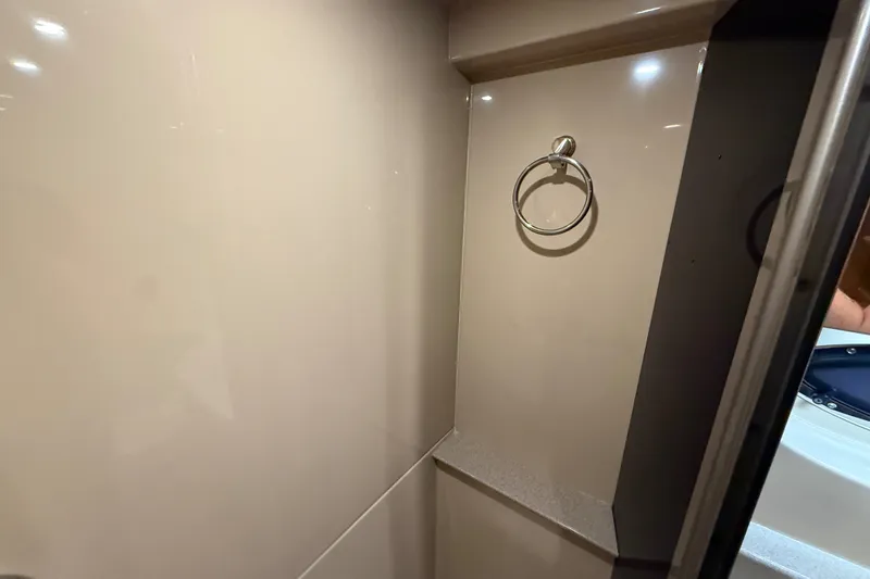 Slide: The Image of 2004 Cruisers Yachts 405 Express Motoryacht interior with towel ring detail. - 88