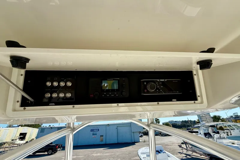 Slide: The Image of Control panel of a 2018 Jupiter 30 HFS boat with electronic displays. - 7