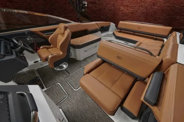 Slide: The Image of Luxurious interior of a Cobalt R8 boat with brown leather seats and modern design. - 13