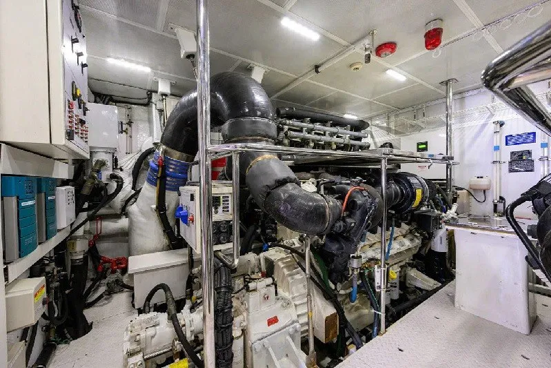 Slide: The Image of Engine room of a 2018 Hargrave Raised Pilothouse yacht, showcasing complex machinery and systems. - 68