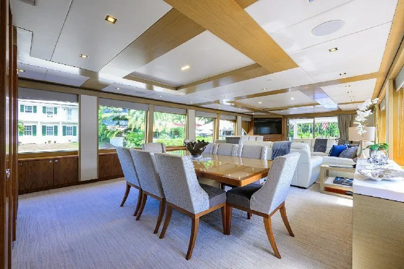 Slide: The Image of Luxurious interior of 2018 Hargrave Raised Pilothouse yacht with elegant dining area and large windows. - 25