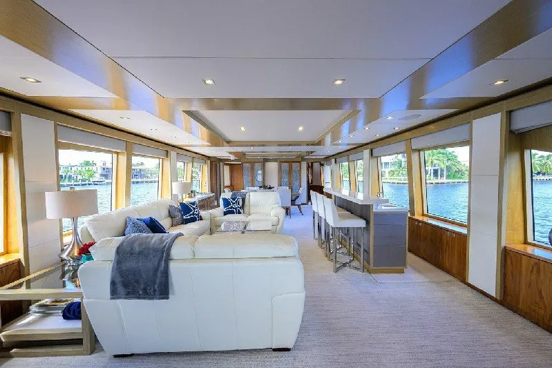Slide: The Image of Luxurious interior of 2018 Hargrave Raised Pilothouse yacht with elegant seating and panoramic windows. - 19