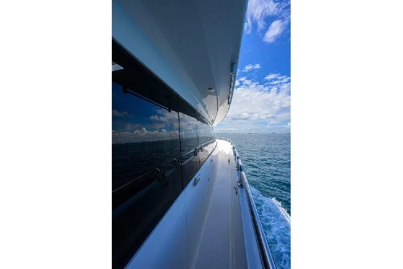 Slide: The Image of 2018 Hargrave Raised Pilothouse yacht cruising on open sea under blue sky. - 15