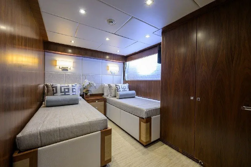 Slide: The Image of Luxurious twin cabin interior of 2018 Hargrave Raised Pilothouse yacht with elegant wood finishes. - 48