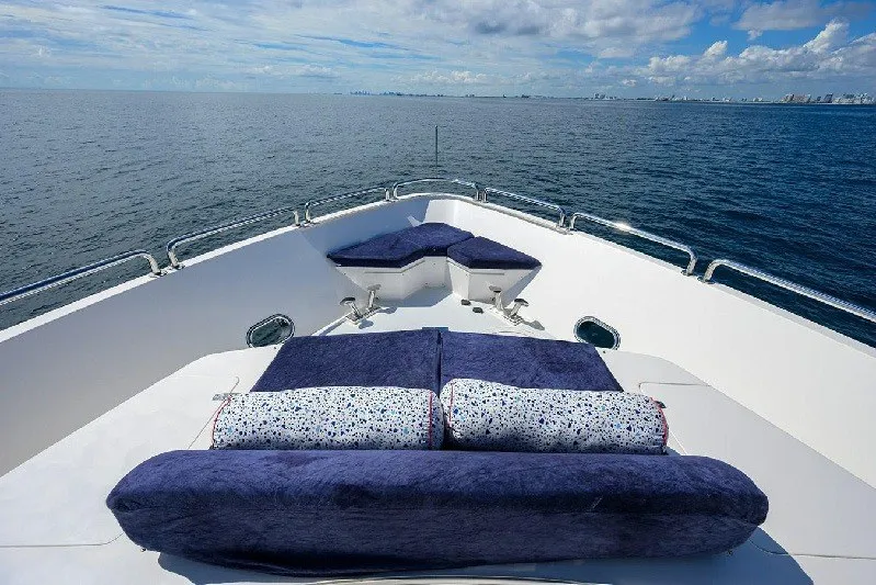 Slide: The Image of Luxurious 2018 Hargrave Raised Pilothouse yacht deck with plush seating, overlooking serene ocean waters. - 17