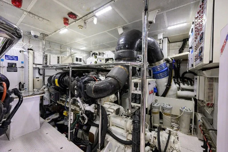 Slide: The Image of Engine room of 2018 Hargrave Raised Pilothouse yacht, showcasing complex machinery and systems. - 67