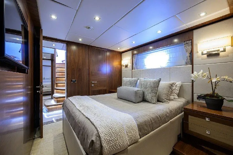 Slide: The Image of Luxurious bedroom interior of 2018 Hargrave Raised Pilothouse yacht with elegant decor and lighting. - 52